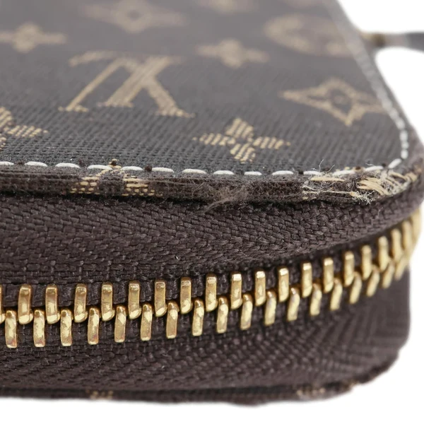 LOUIS VUITTON Monogram Mini Lin Canvas Zippy Wallet Brown