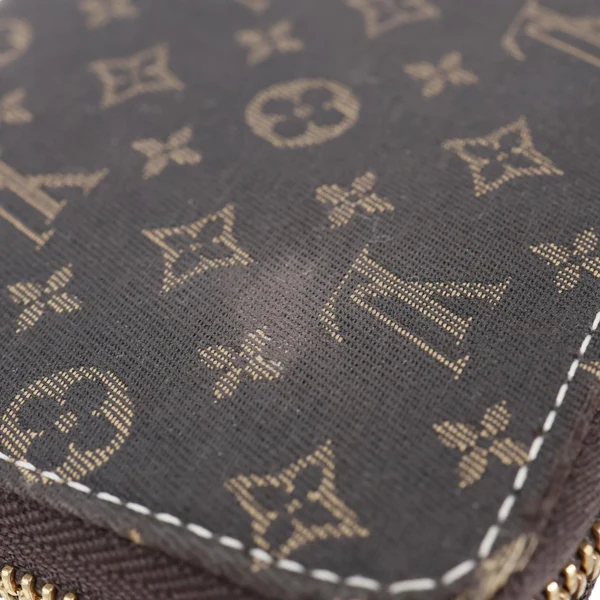 LOUIS VUITTON Monogram Mini Lin Canvas Zippy Wallet Brown