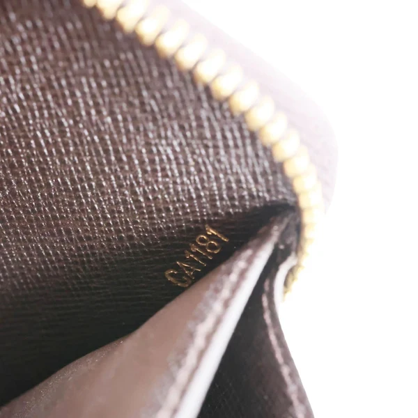 LOUIS VUITTON Monogram Mini Lin Canvas Zippy Wallet Brown