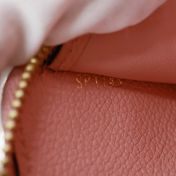 LOUIS VUITTON Monogram Empreinte Leather Zippy Wallet Rose Poudre Pink