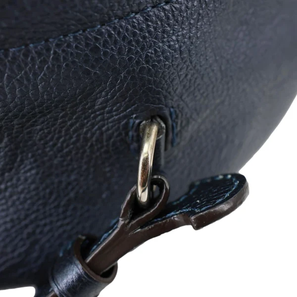 LOUIS VUITTON Flower Pins Monogram Empreinte Leather Backpack Blue