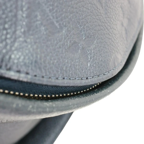 LOUIS VUITTON Flower Pins Monogram Empreinte Leather Backpack Blue