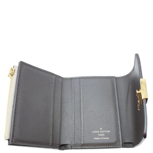 LOUIS VUITTON Capucines Taurillon Compact Leather Wallet Beige