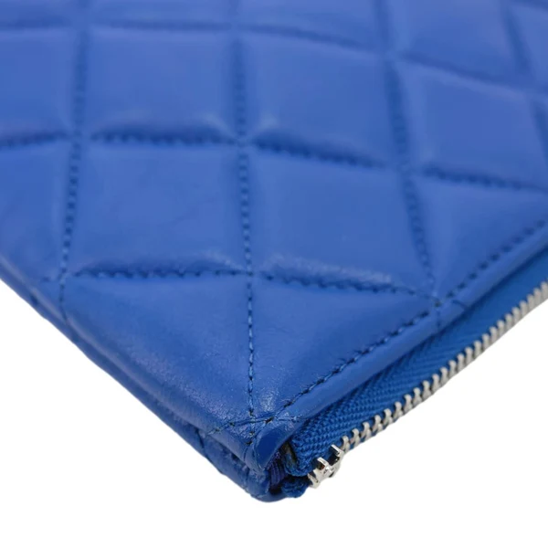 CHANEL O Case Large Quilted Lambskin Leather Clutch Blue