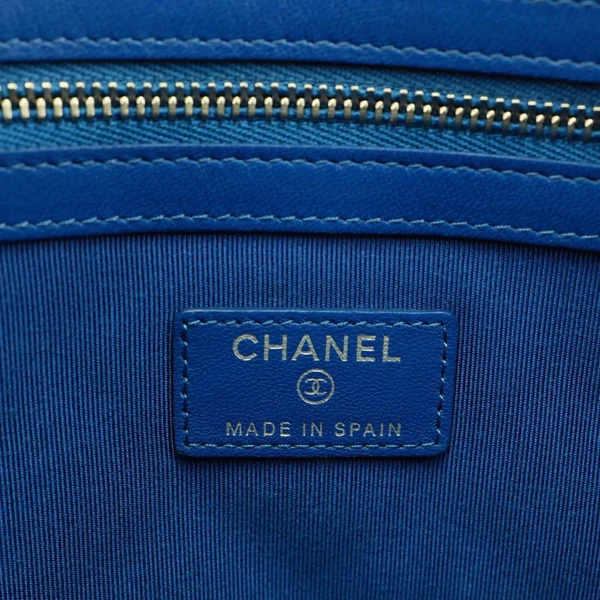 CHANEL O Case Large Quilted Lambskin Leather Clutch Blue