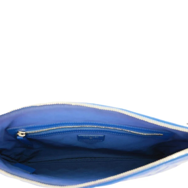 CHANEL O Case Large Quilted Lambskin Leather Clutch Blue