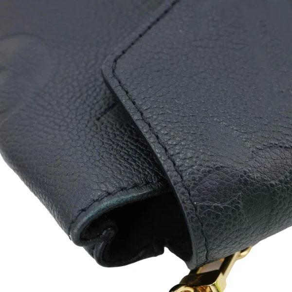 LOUIS VUITTON Tiny Monogram Empreinte Leather Backpack Black