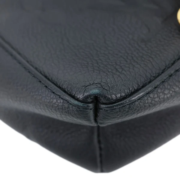 LOUIS VUITTON Tiny Monogram Empreinte Leather Backpack Black