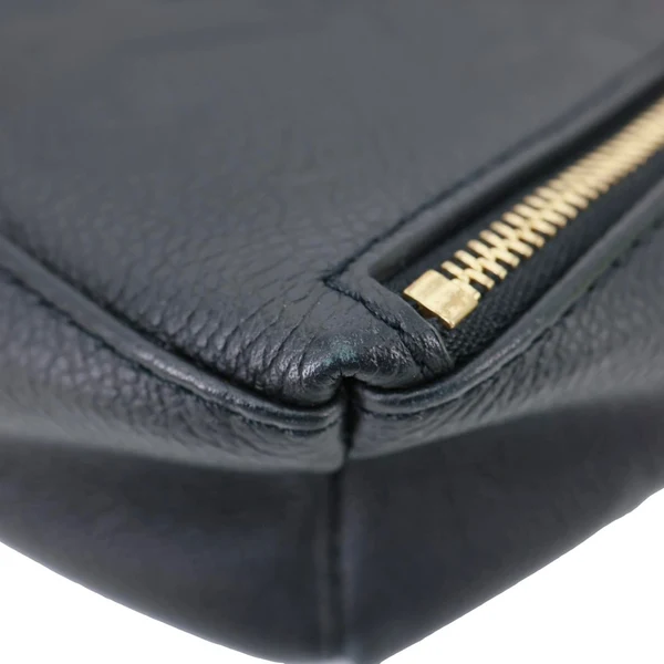 LOUIS VUITTON Tiny Monogram Empreinte Leather Backpack Black