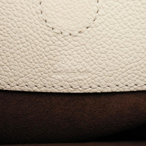 LOUIS VUITTON Trianon PM Giant Monogram Empreinte Leather Tote Bag White