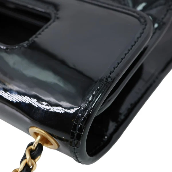 CHANEL Graphic Catch Flap Mini Quilted Patent Leather Shoulder Bag Black