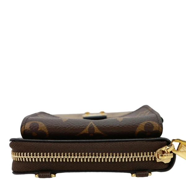 LOUIS VUITTON Metis Reverse Monogram Canvas Vertical Zippy Chain Wallet Brown