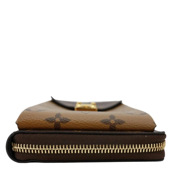 LOUIS VUITTON Metis Reverse Monogram Canvas Vertical Zippy Chain Wallet Brown