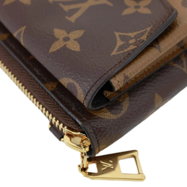 LOUIS VUITTON Metis Reverse Monogram Canvas Vertical Zippy Chain Wallet Brown