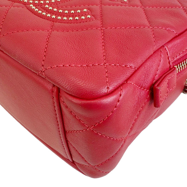 CHANEL Studded Beauty Begins Quilted Lambskin Leather Camera Case Red