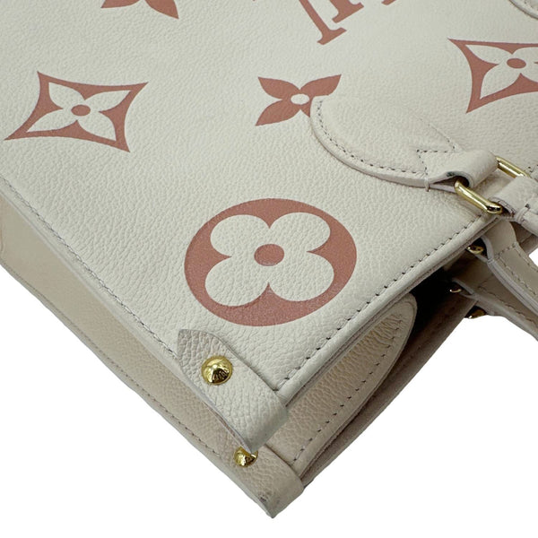 LOUIS VUITTON Onthego MM Giant Monogram Empreinte Leather Tote Bag Bicolor
