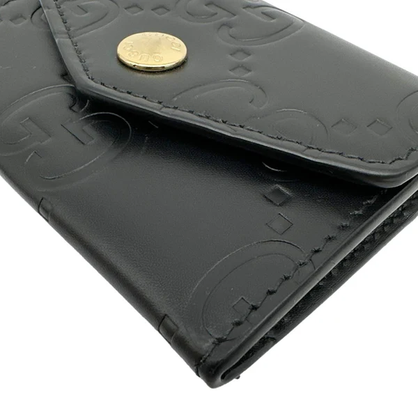 GUCCI Snap Gilbert Jumbo GG Calfskin Embossed Leather Men's Wallet Black 772792
