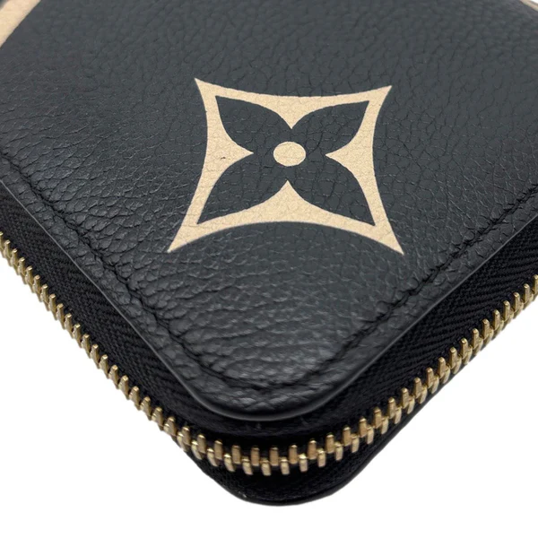 LOUIS VUITTON Monogram Empreinte Leather Zippy Wallet Bicolor