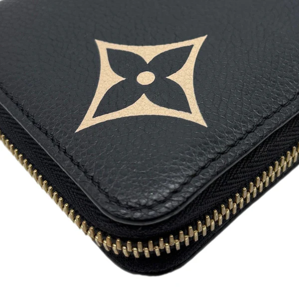 LOUIS VUITTON Monogram Empreinte Leather Zippy Wallet Bicolor