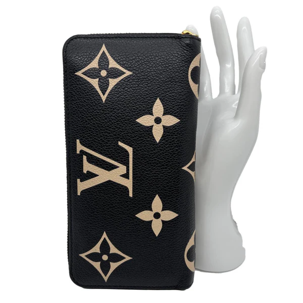 LOUIS VUITTON Monogram Empreinte Leather Zippy Wallet Bicolor