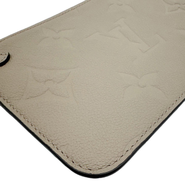 LOUIS VUITTON Empreinte Leather Wristlet Beige