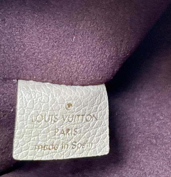 LOUIS VUITTON Empreinte Leather Wristlet Beige