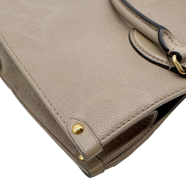 LOUIS VUITTON Onthego MM Giant Monogram Empreinte Leather Tote Bag Beige