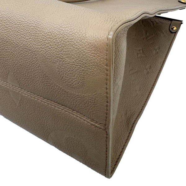 LOUIS VUITTON Onthego MM Giant Monogram Empreinte Leather Tote Bag Beige