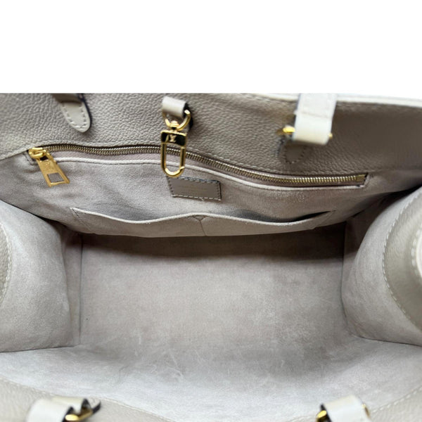 LOUIS VUITTON Onthego MM Giant Monogram Empreinte Leather Tote Bag Beige